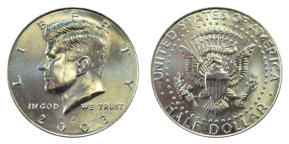 2003 Kennedy half dollar comparison: normal silver-gray coin vs missing clad layer error showing copper-brown obverse