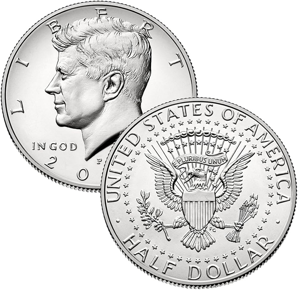Grading strip showing four 2003 Kennedy half dollars from worn to gem uncirculated across all condition tiers